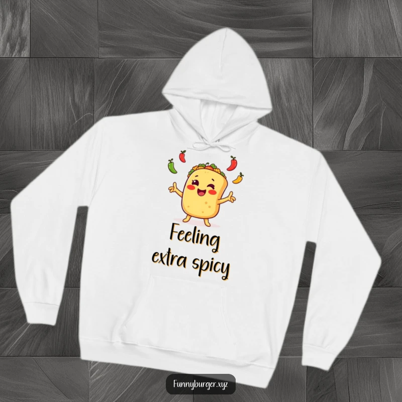 Funny taco juggling hoodie featuring an excited, anthropomorphic taco waving arms and juggling peppers, offering humorous comfort and a gift.