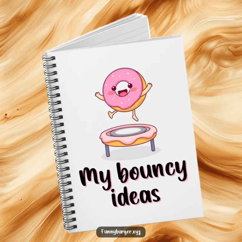 Funny notebook cover featuring a donut character bouncing on a frosting trampoline, ideal for jotting down sweet ideas.